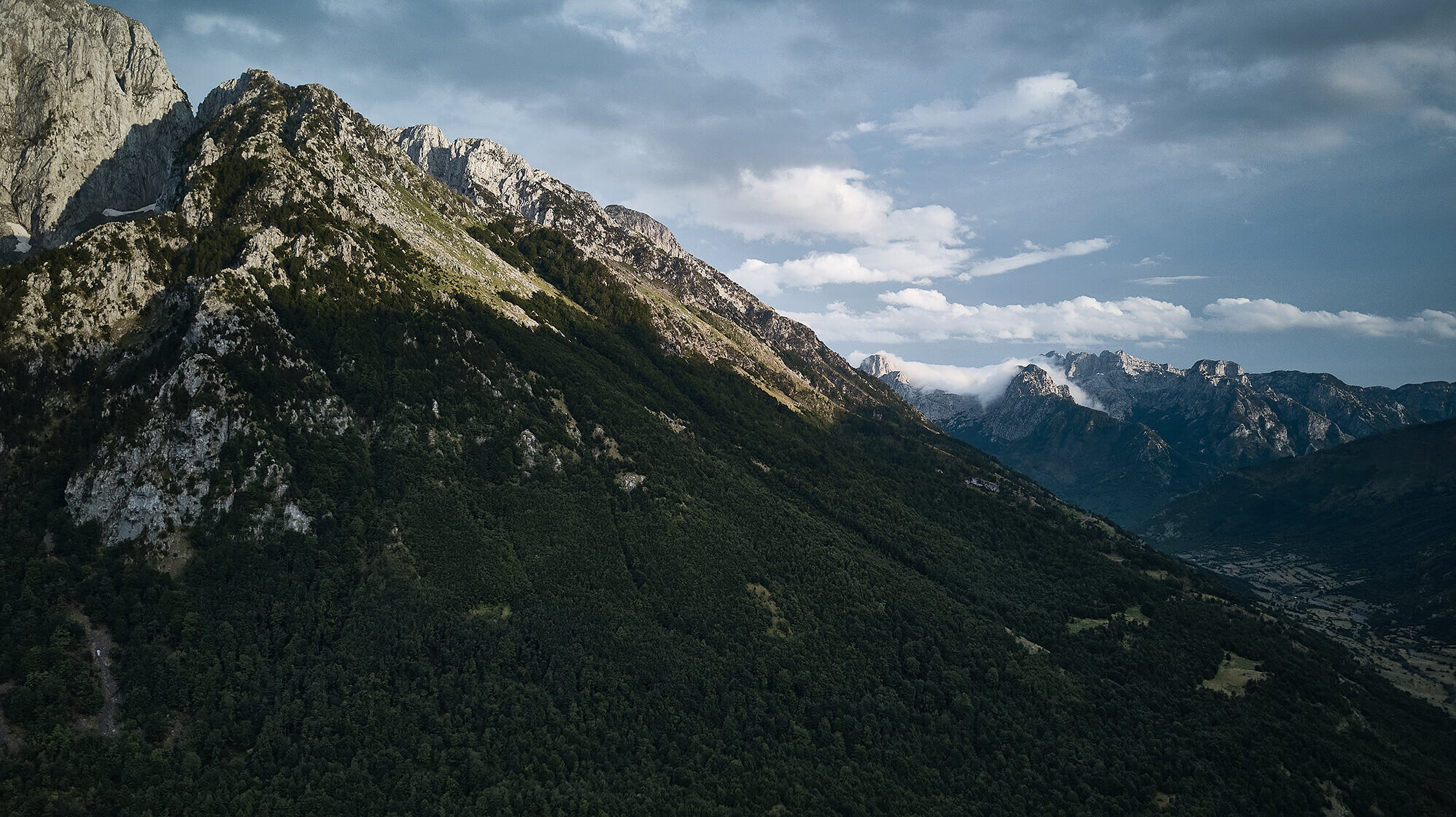 aerial-view-beautiful-mountains-albania-cloudy-sky-sunny-day